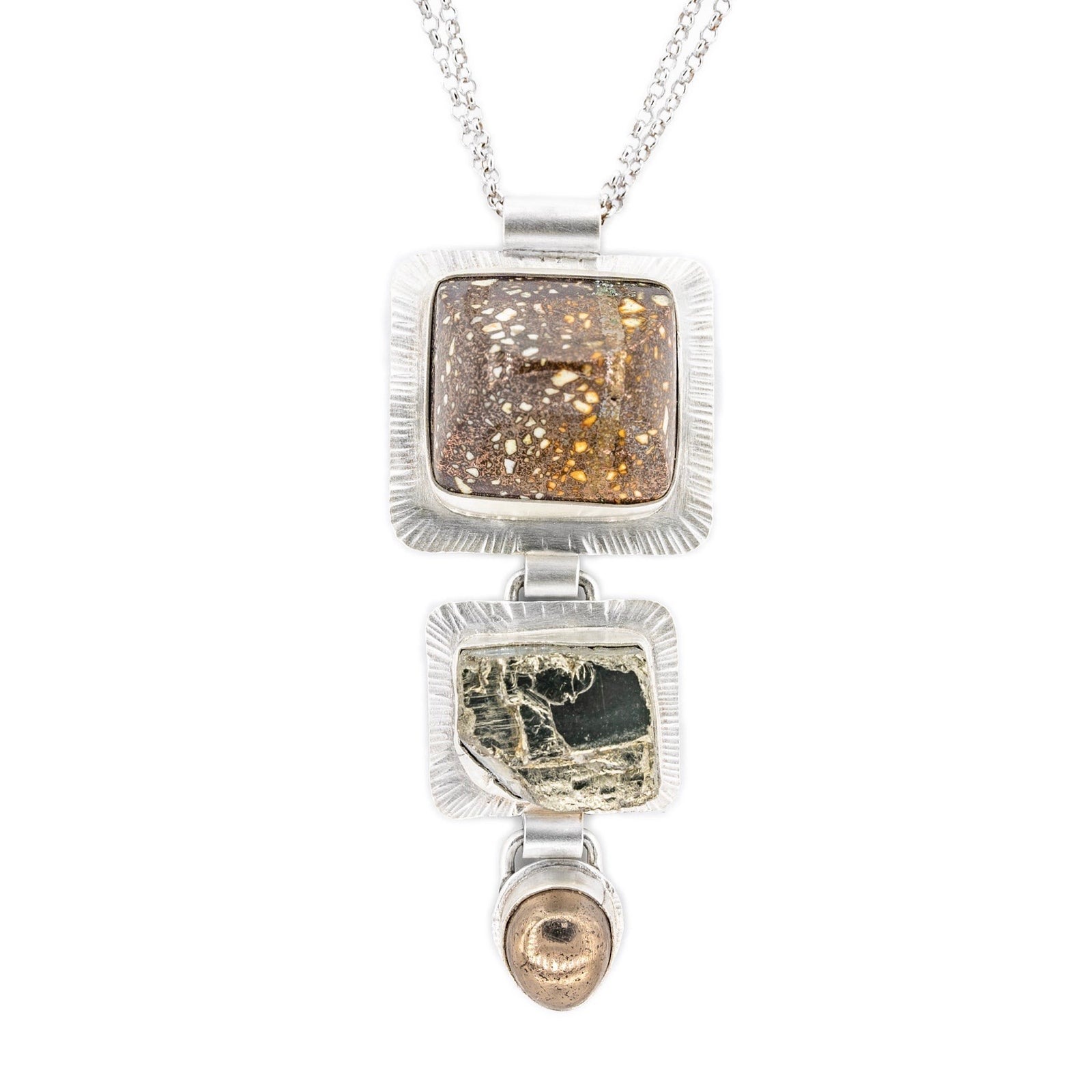 Original Sin Jewelry Nampeyo three stone pendant necklace featuring copper fire brick, pyrite, and nickeline in silver.