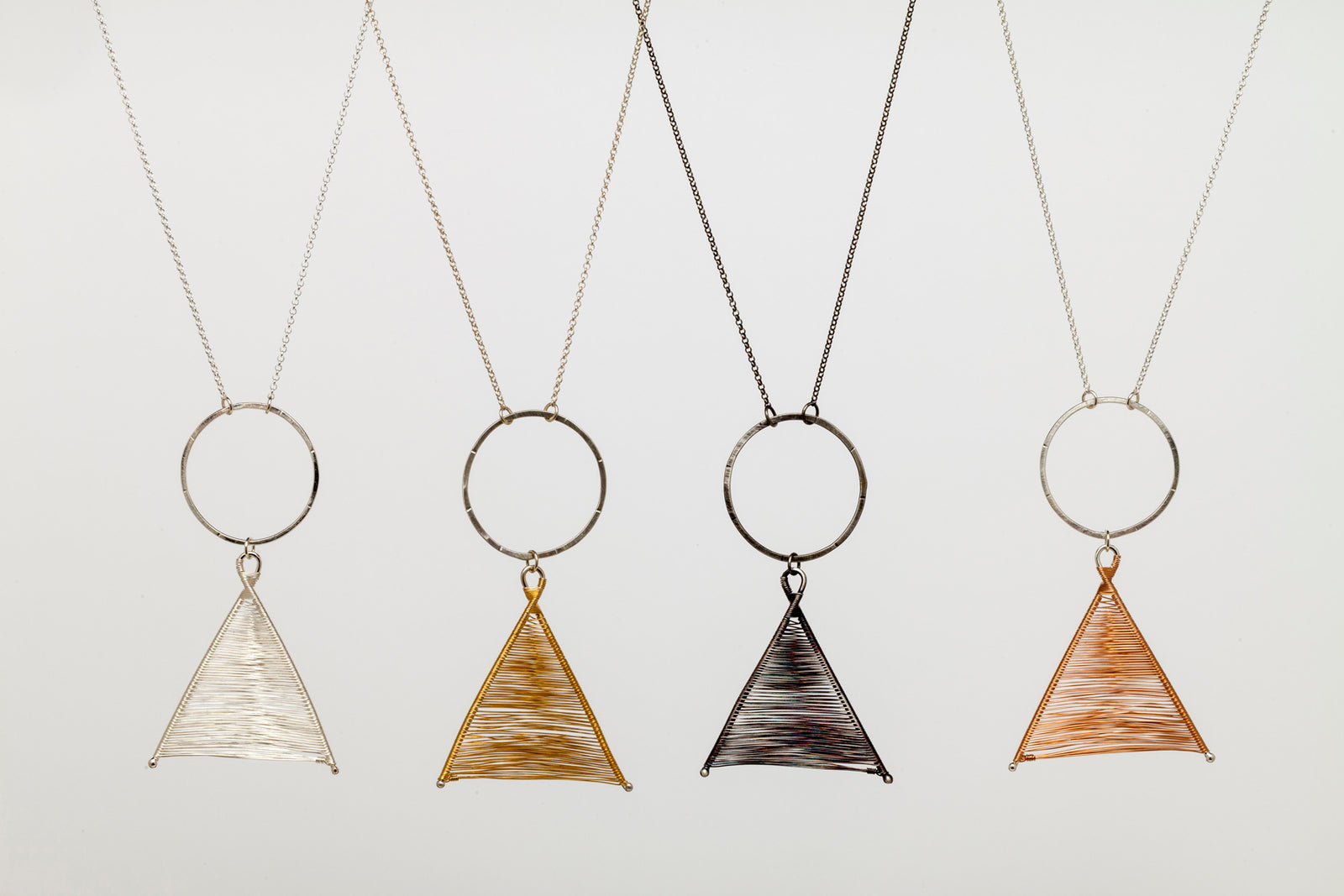 Original Sin Jewelry Long Circle Wishbone Necklace in four variants.