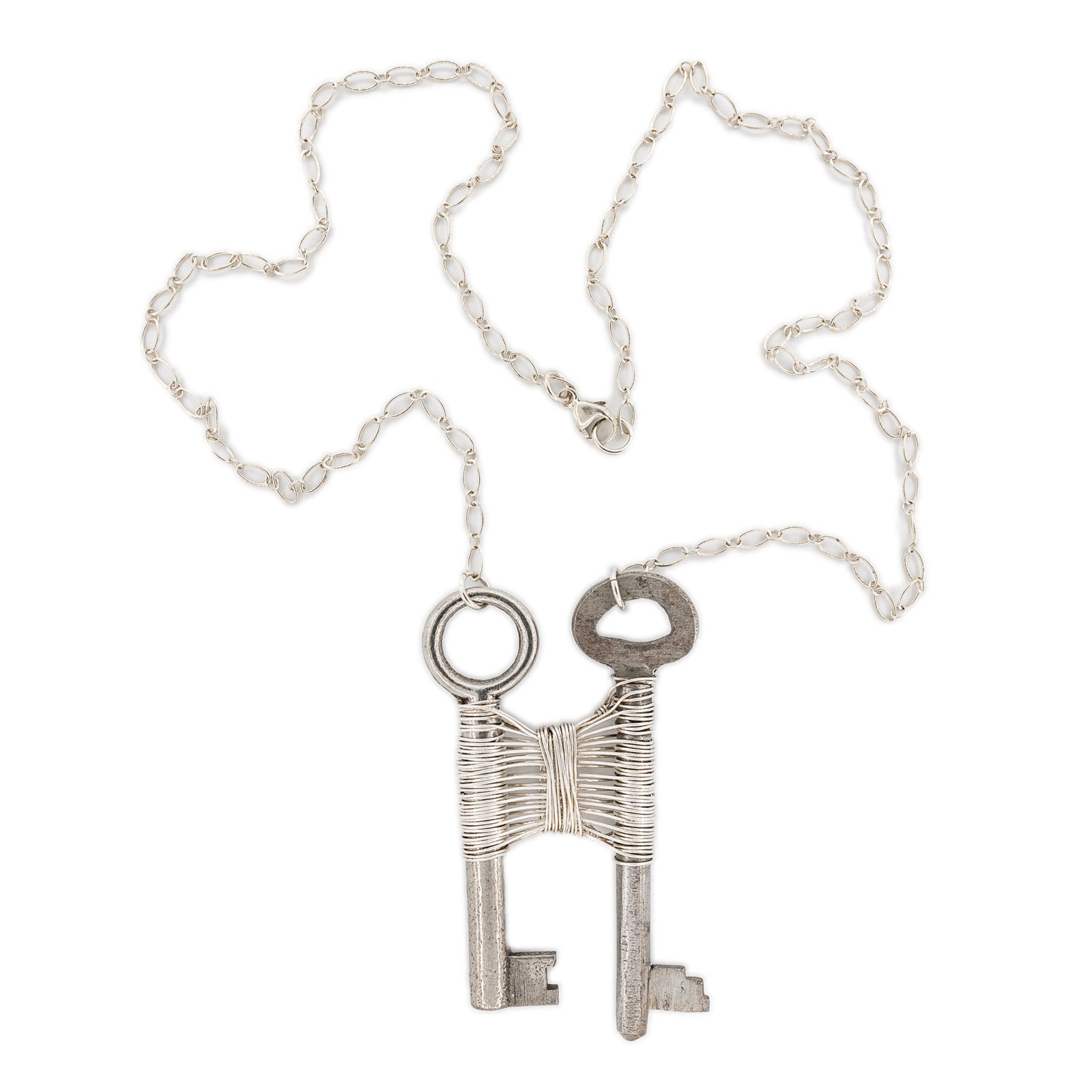 Woven Silver Vintage Skeleton Key Pendant on Silver Necklace by OSJ in Tucson Arizona
