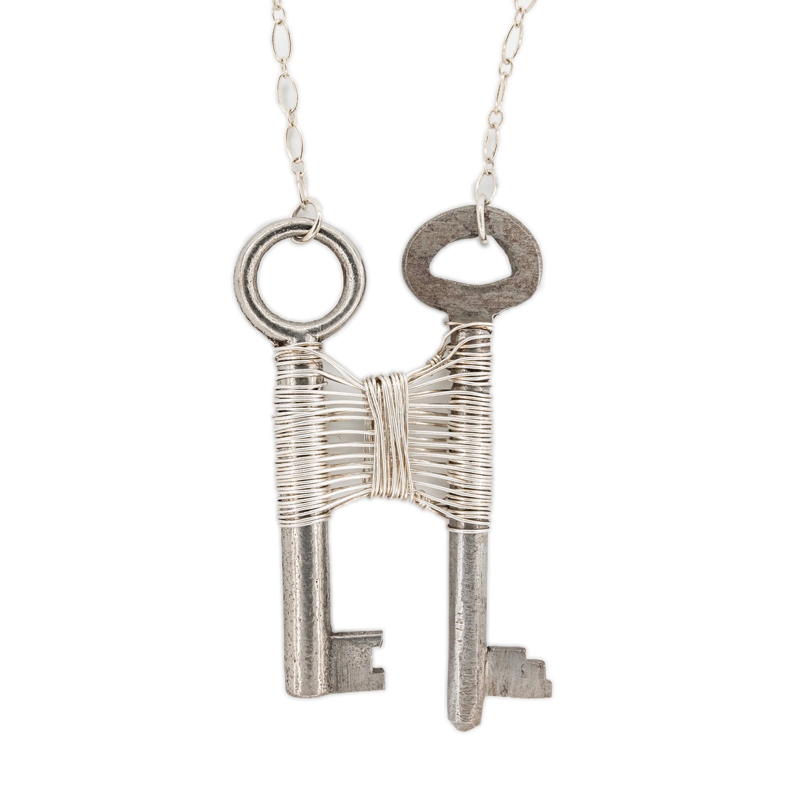 Woven Silver Vintage Skeleton Key Pendant on Silver Necklace by OSJ in Tucson Arizona